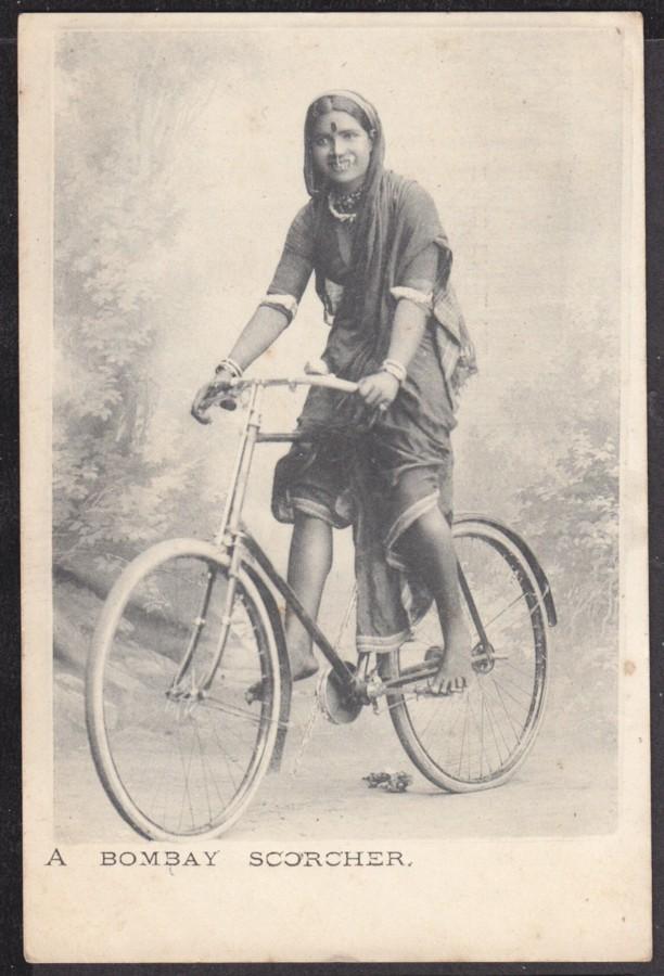 An Young Woman in Indian Traditional Dress, Rides Bicycle - Bombay (Mumbai) Undated Photograph