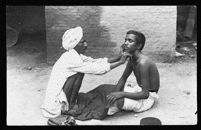 Barber Shaves Customer