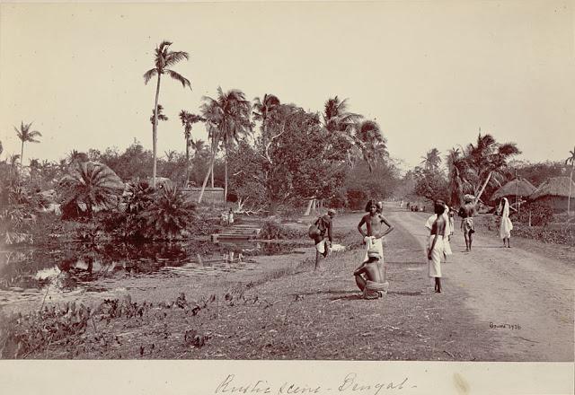 Bengali Men in Costume by Pond Near Village of Mud and Thatch Houses by Samuel Bourne 1863