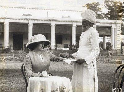 Indian servant serving tea