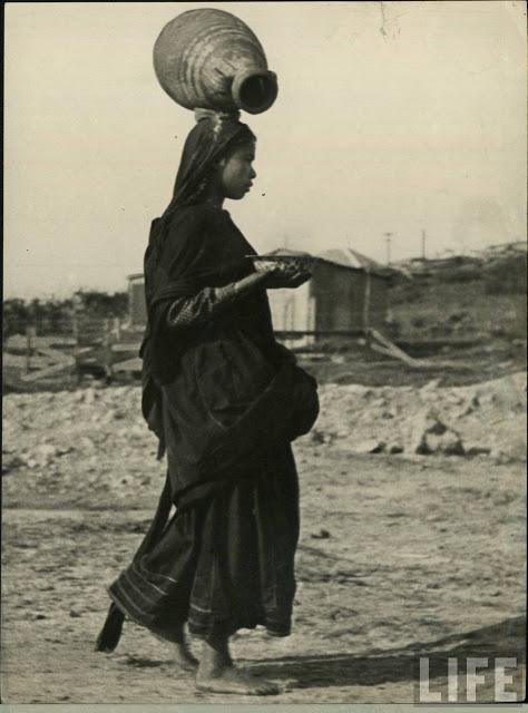 Indian Woman Carrying a Pot