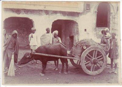 Sweepers clearing away road - 1880s