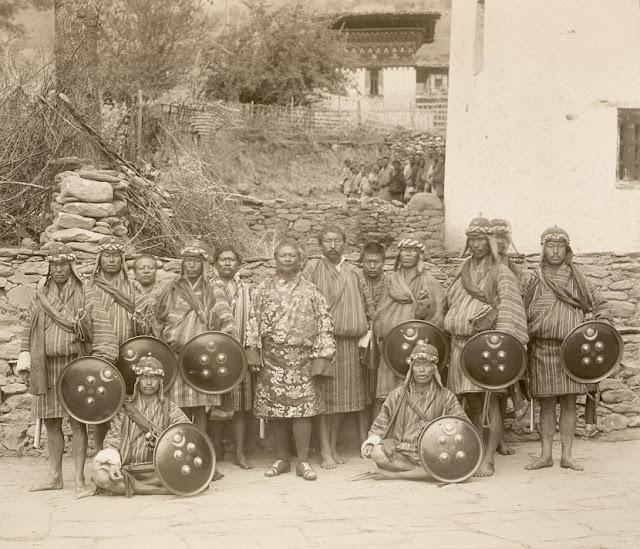 Trongsa Penlop's (Governor) bodyguard, Governor Sir Ugyen Wangchuk himself standing in the centre, at Tongsa Dzong in Bhutan 1905